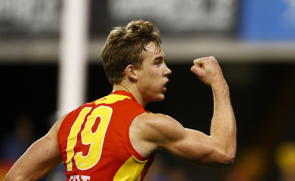 AFL 2016 Rd 20 - Gold Coast v GWS Giants GOLD COAST, AUSTRALIA - AUGUST 06: Tom Lynch of the Suns celebrates a goal during the 2016 AFL Round 20 match between the Gold Coast Suns and the GWS Giants at Metricon Stadium on August 06, 2016 in Gold Coast, Australia. (Photo by Jason O'Brien/AFL Media)